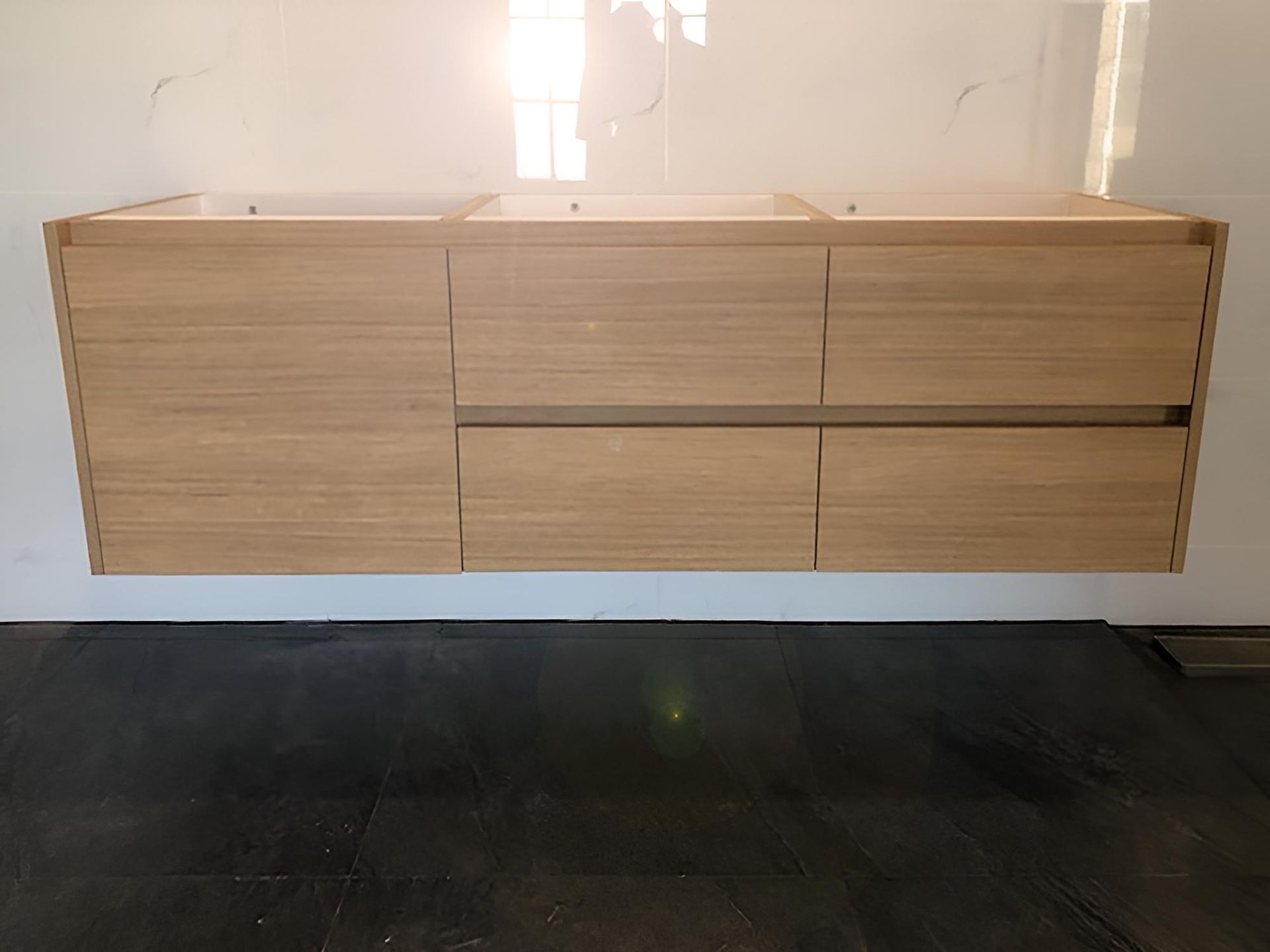 A Bathroom Vanity With Two Sinks and Drawers Hanging From the Wall — BM Cabinetry In Spring Grove, NSW
