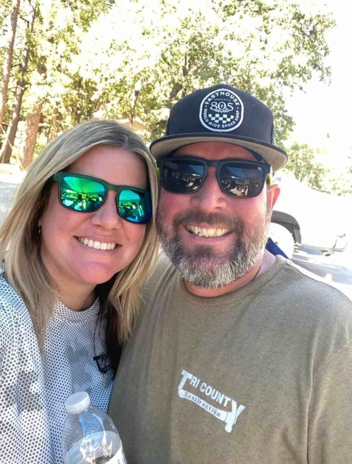 chris and cori, owners of tri county construction.