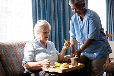 Elderly Care Services — Nurse Helping Senior Man Walk in Boward Country, FL