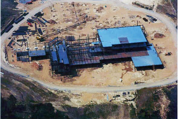 An aerial view of a large building under construction