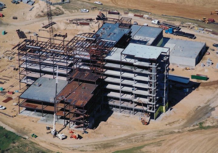 An aerial view of a large building under construction