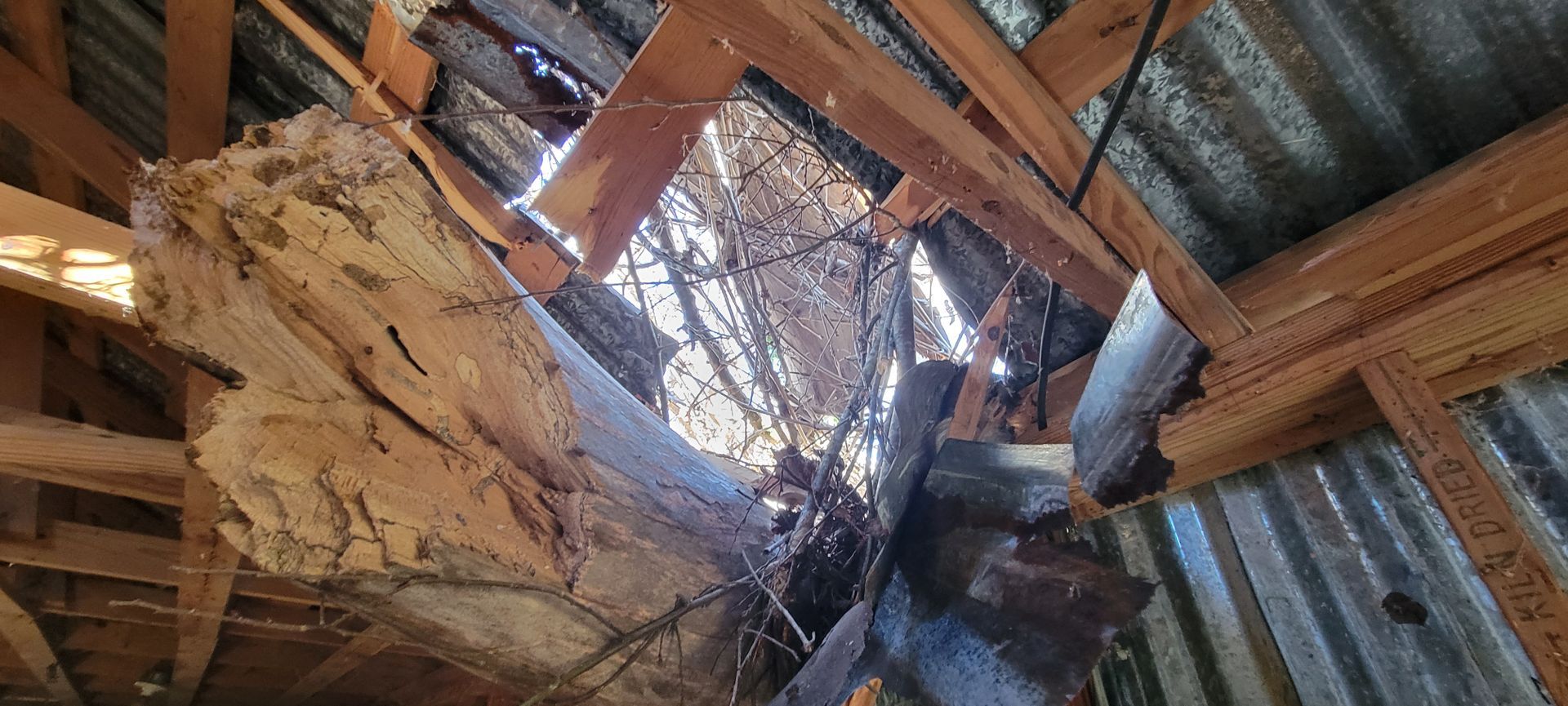 There is a hole in the ceiling of a building.
