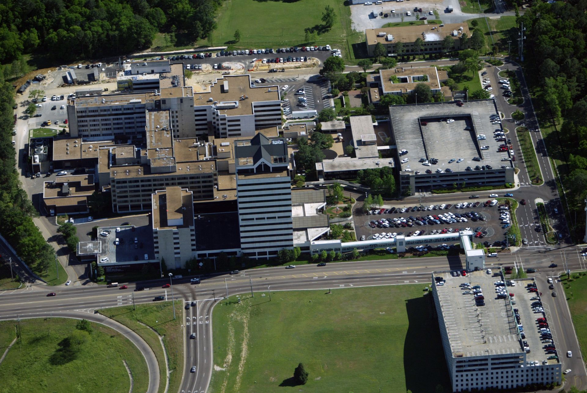 An aerial view of a hospital with lots of buildings