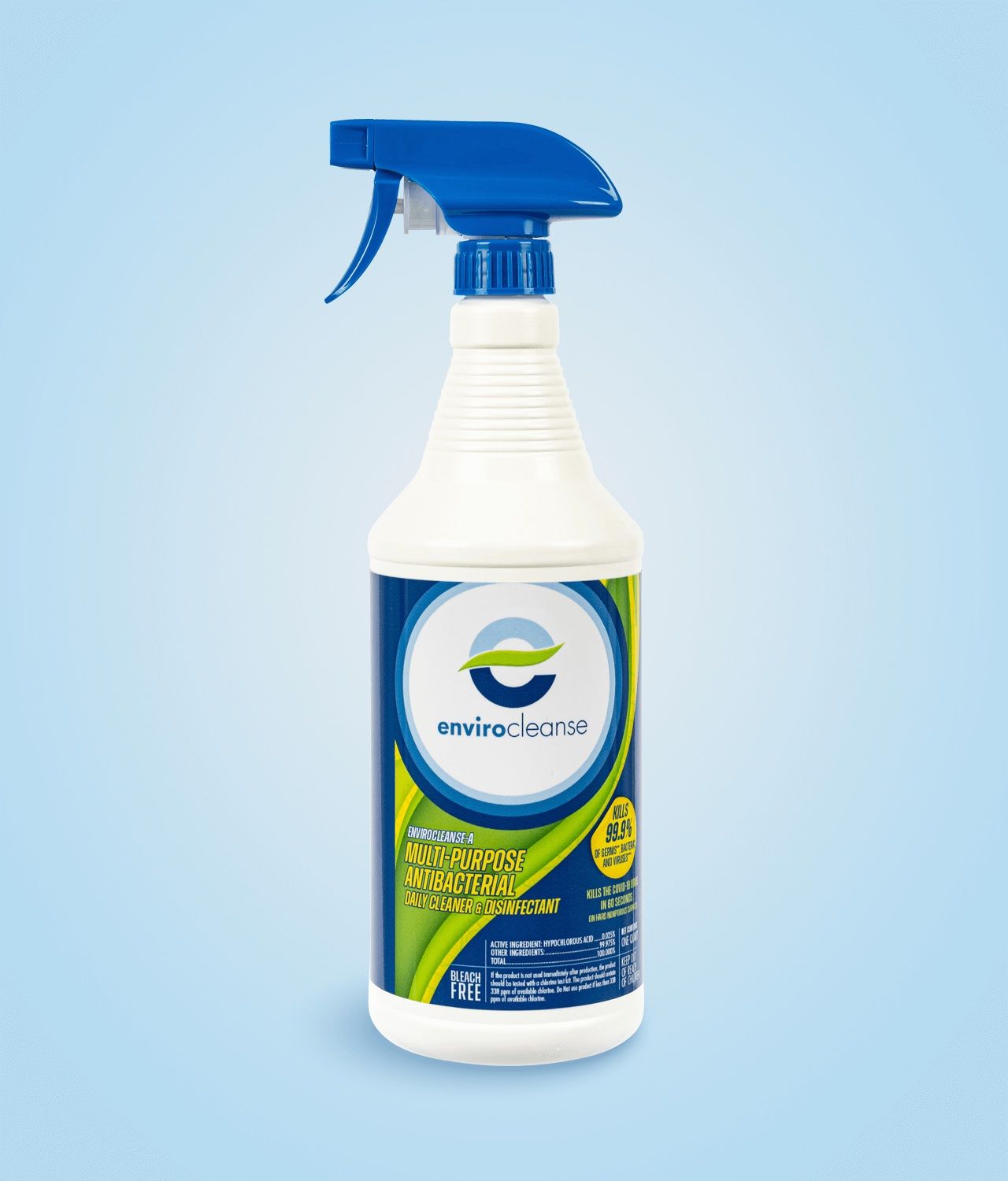 A tanker truck is driving down a road with trees in the background.