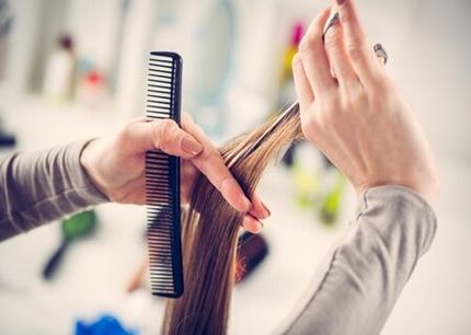 Hairdresser Cutting Woman's Hair — Hair Care in Souderton, PA