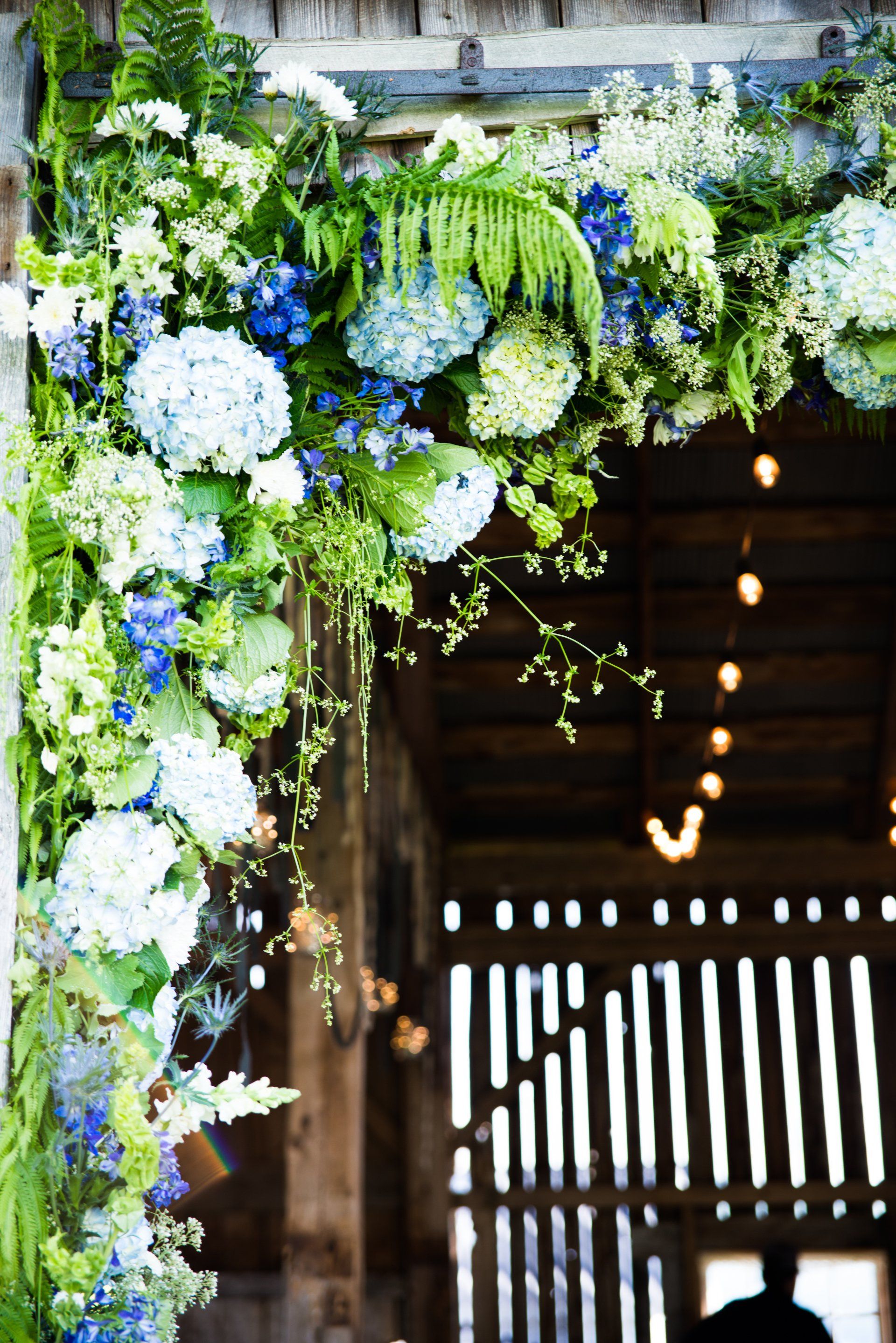 Fresh flower decor accenting the venue entryway