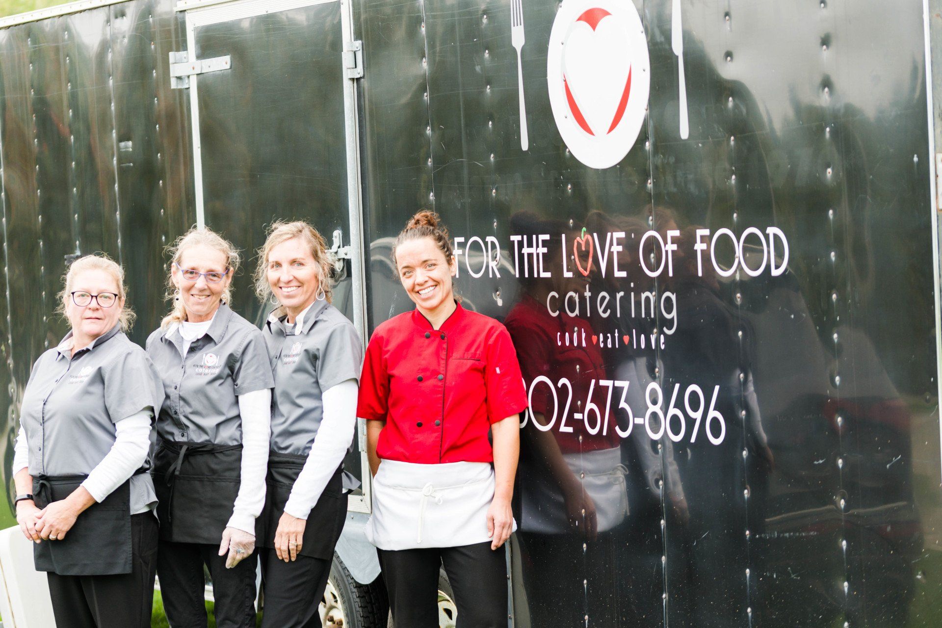 For the Love of Food team with their impressive catering truck on site.