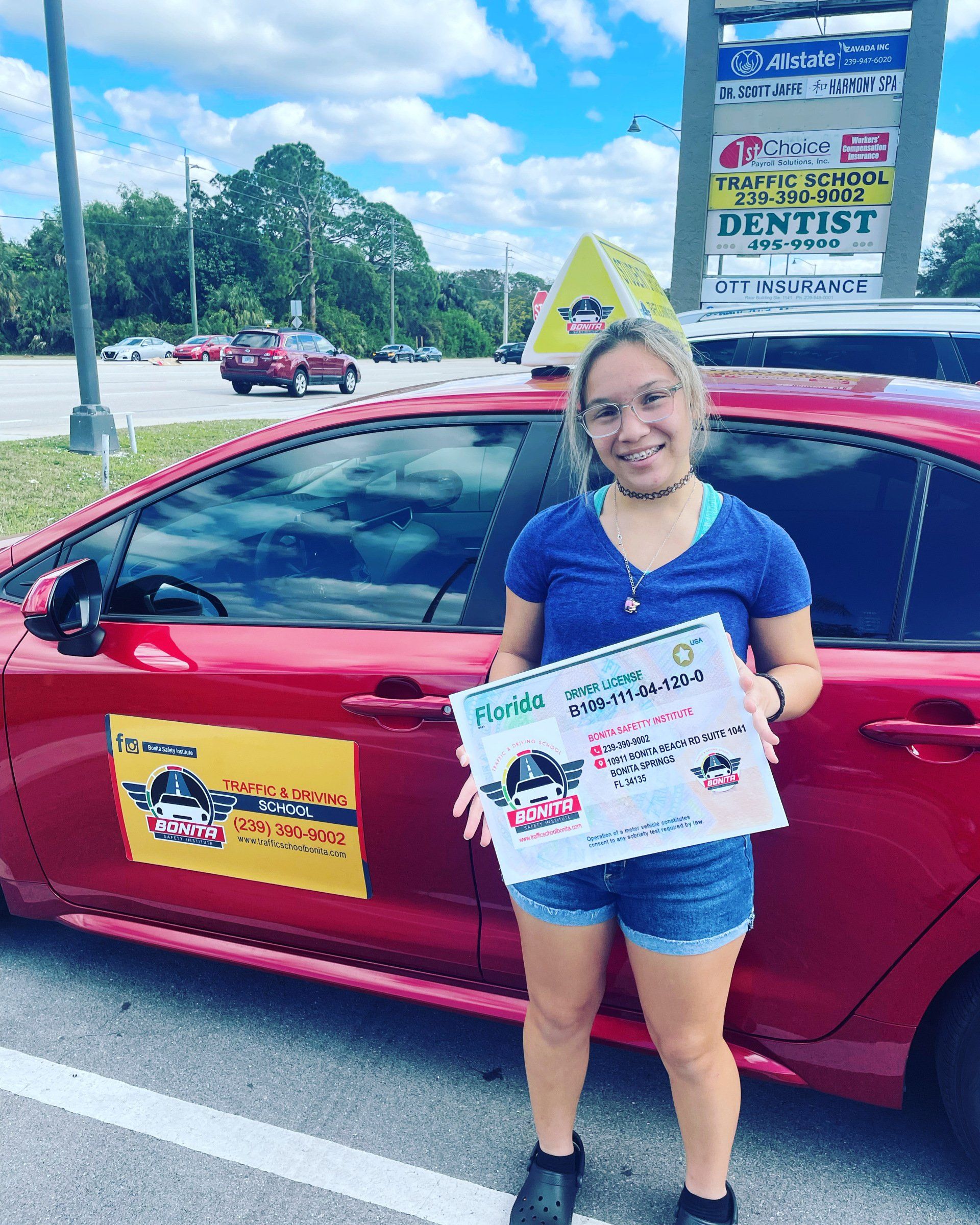 Girl Teen Driver Holding A Certificate — Bonita Springs, FL — Bonita Safety Institute