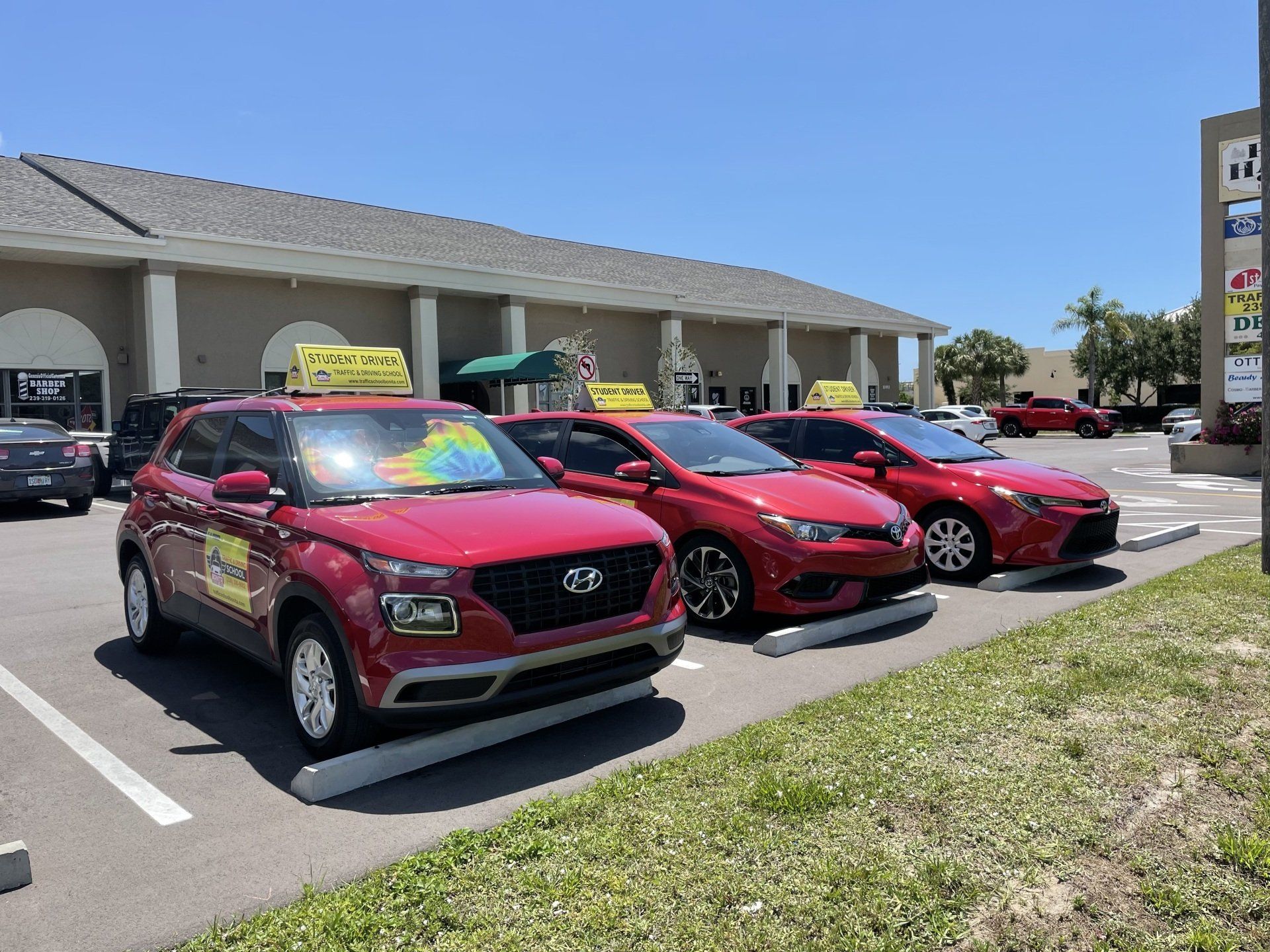 Three Red Cars On The Parking Lot — Bonita Springs, FL — Bonita Safety Institute