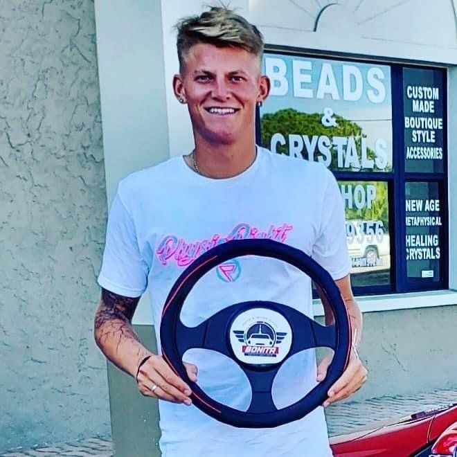 Man Holding A Steering Wheel — Bonita Springs, FL — Bonita Safety Institute
