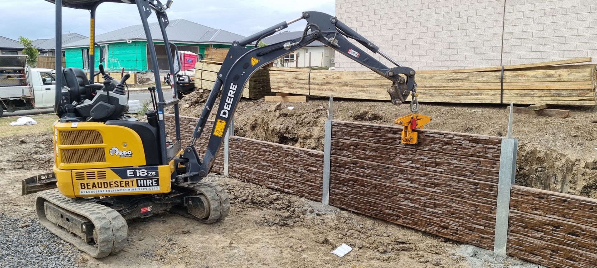 Small Excavator Excavating at Construction Site — Beaudesert Equipment Hire Services in Beaudesert, QLD