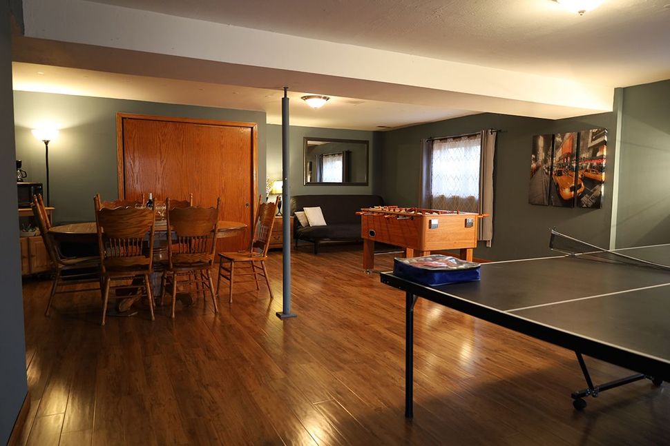 game room with foosball and ping pong