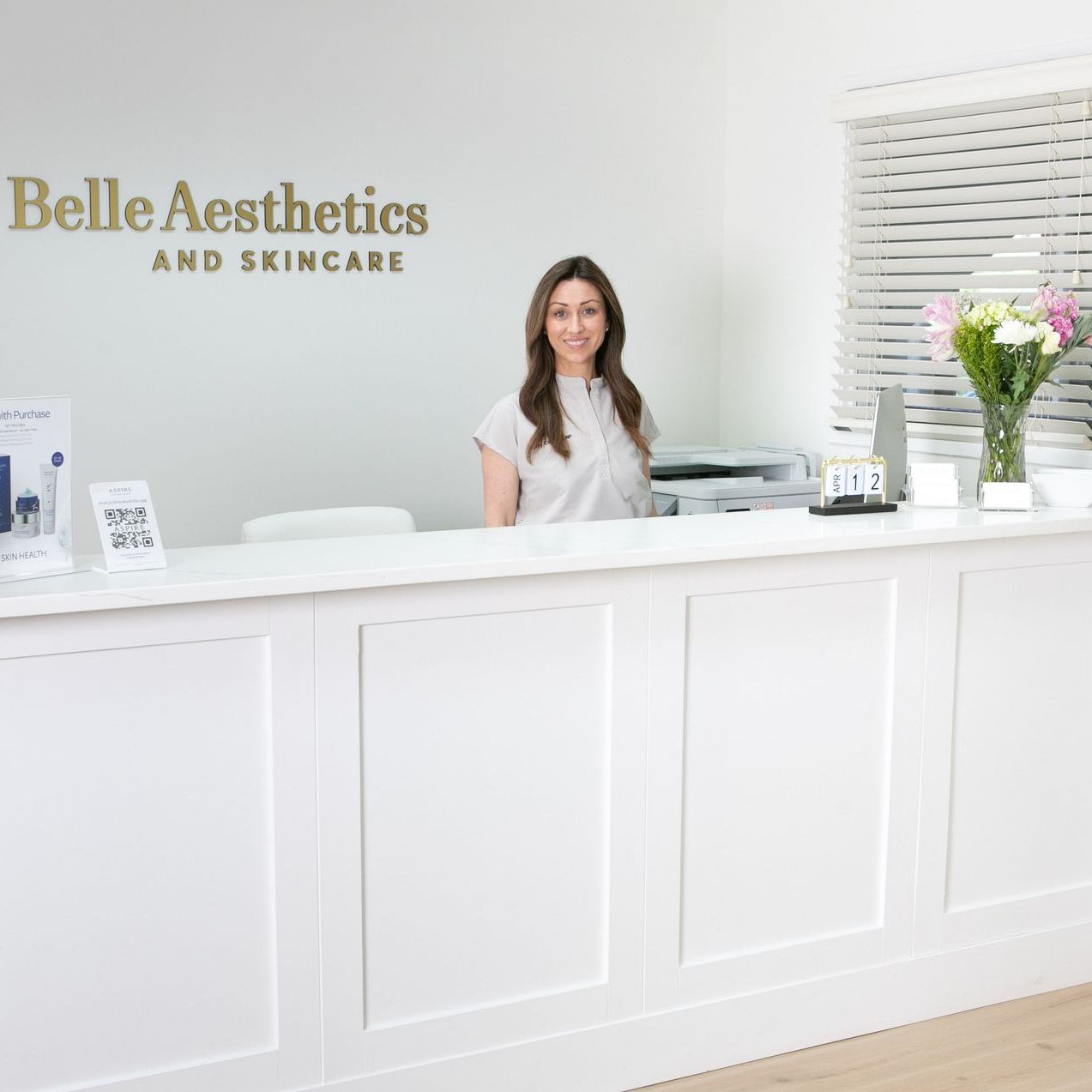 A woman is getting a facial treatment in a beauty salon.