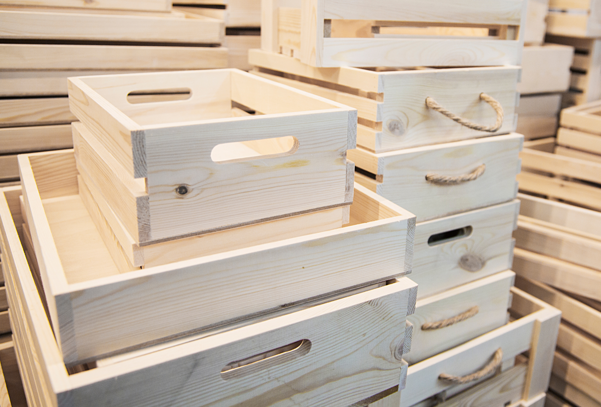 A pile of wooden crates stacked on top of each other.