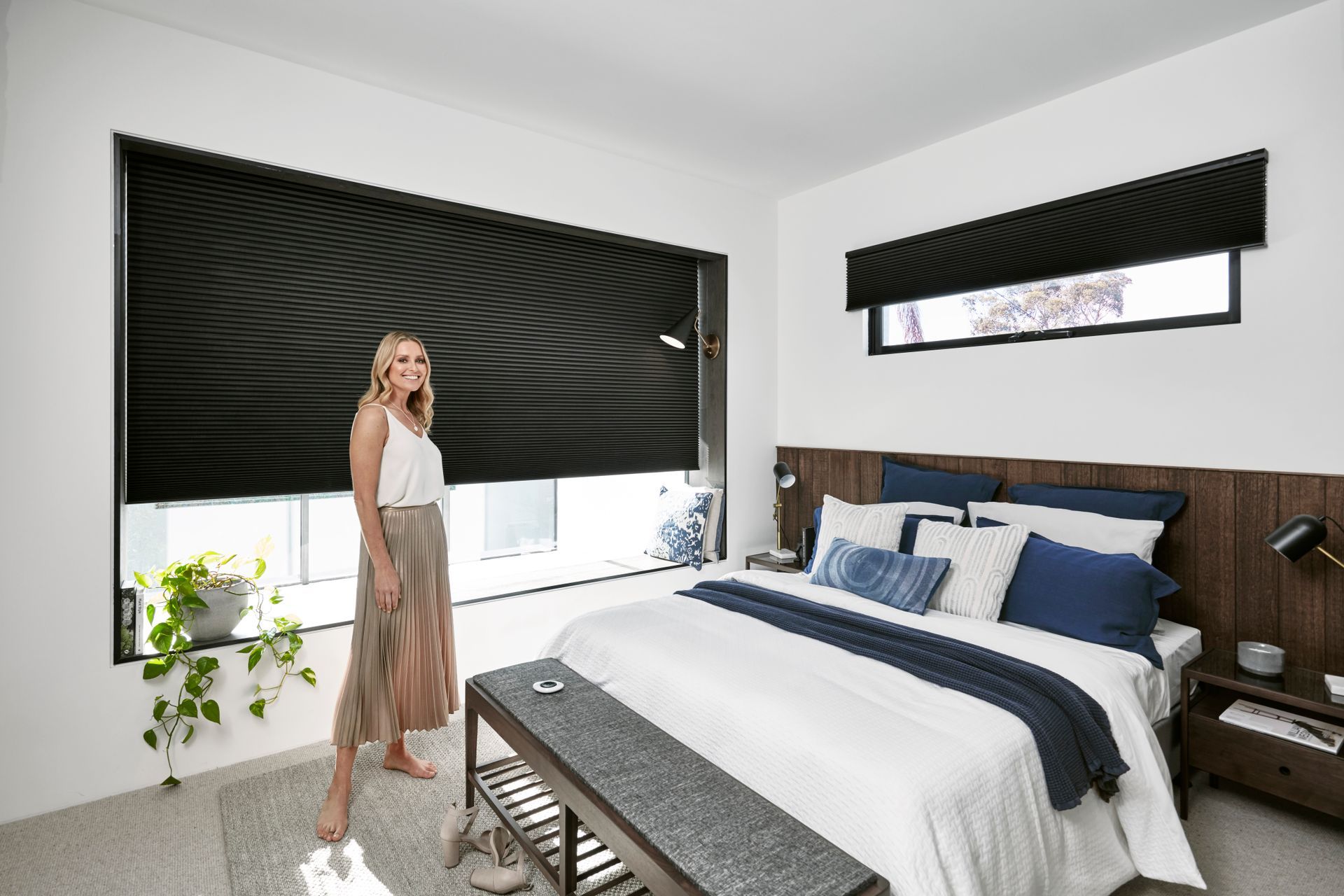 Houseplant Pot Stands On The Bedside Wooden Table Next To Roller Shades — BlindDESIGN In Byron Bay NSW