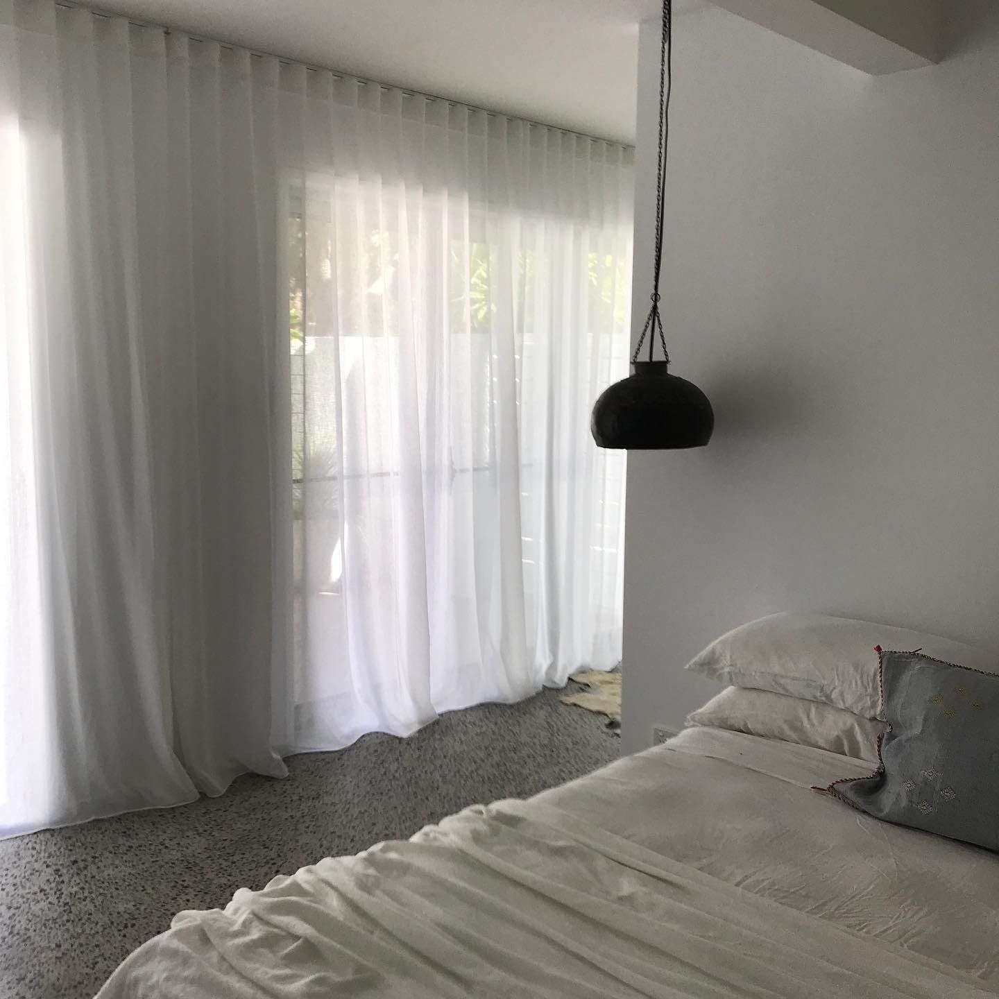 Minimalist Bedroom With White Curtains
