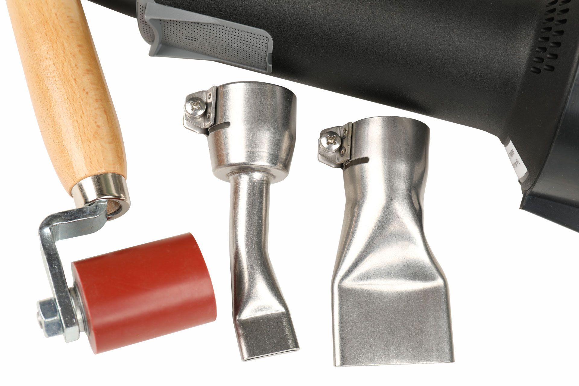 Pistola de calor con dos boquillas y rodillo rojo para aplicación de vinilo.