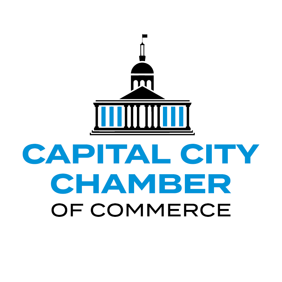 The logo for the capital city chamber of commerce shows a building with a clock tower.