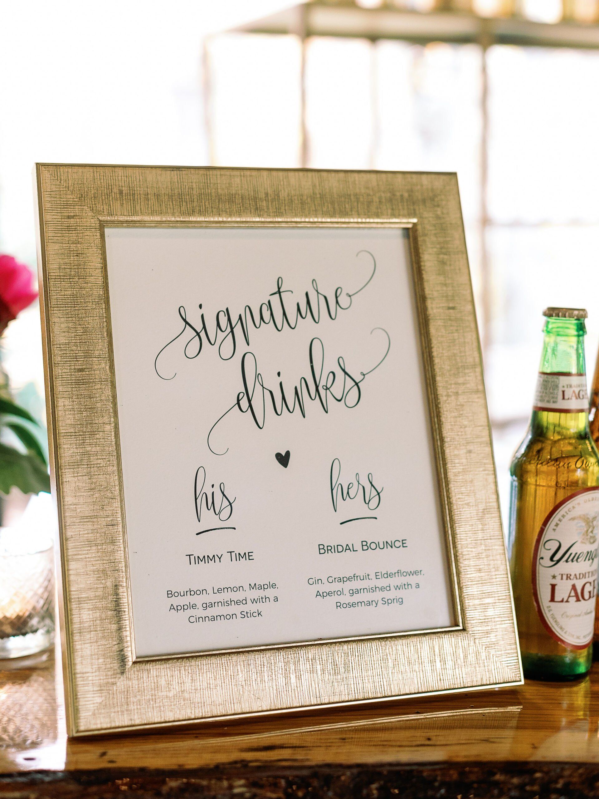 A sign that says signature drinks on it