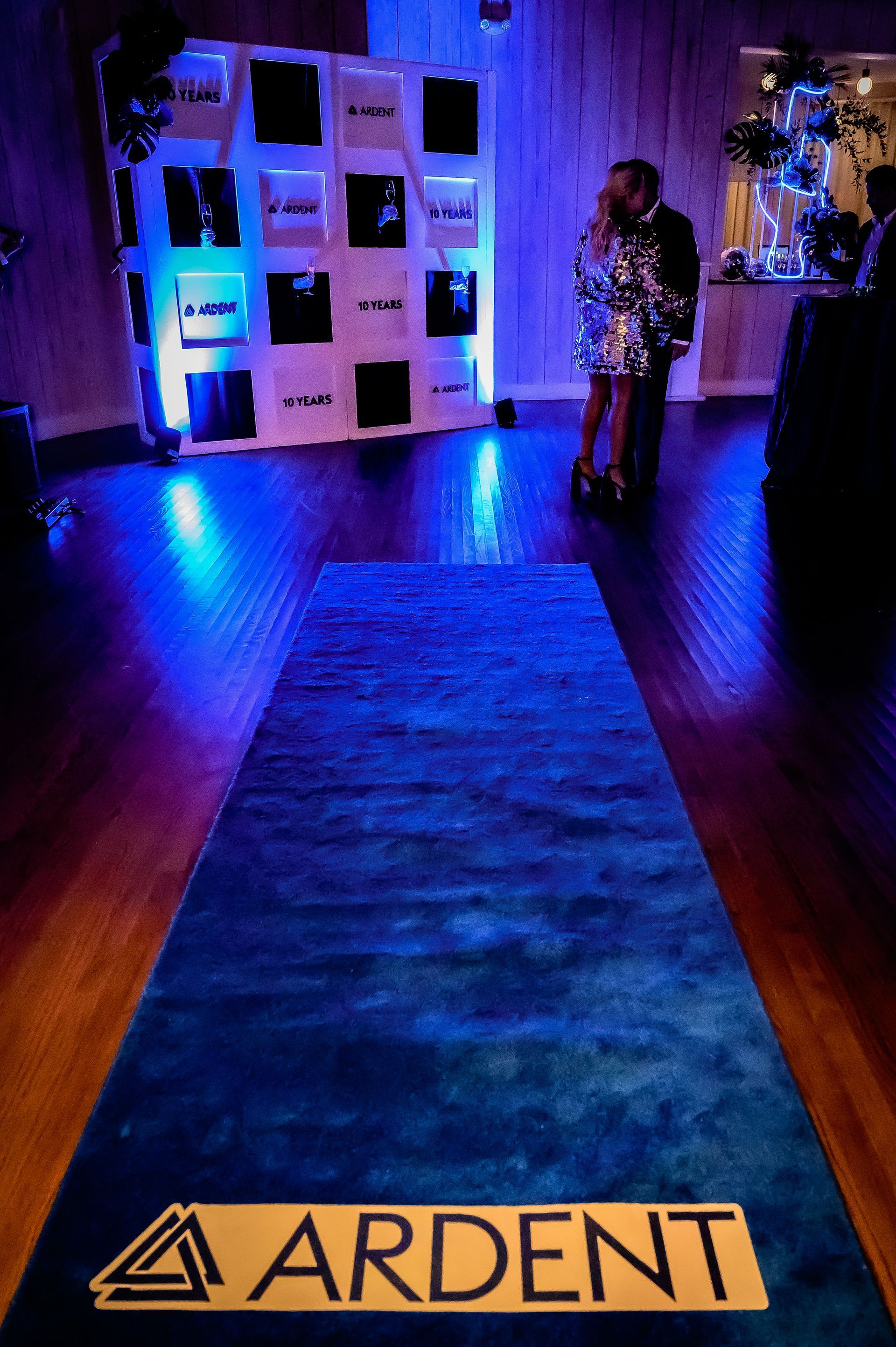 A blue rug with the word ardent on it