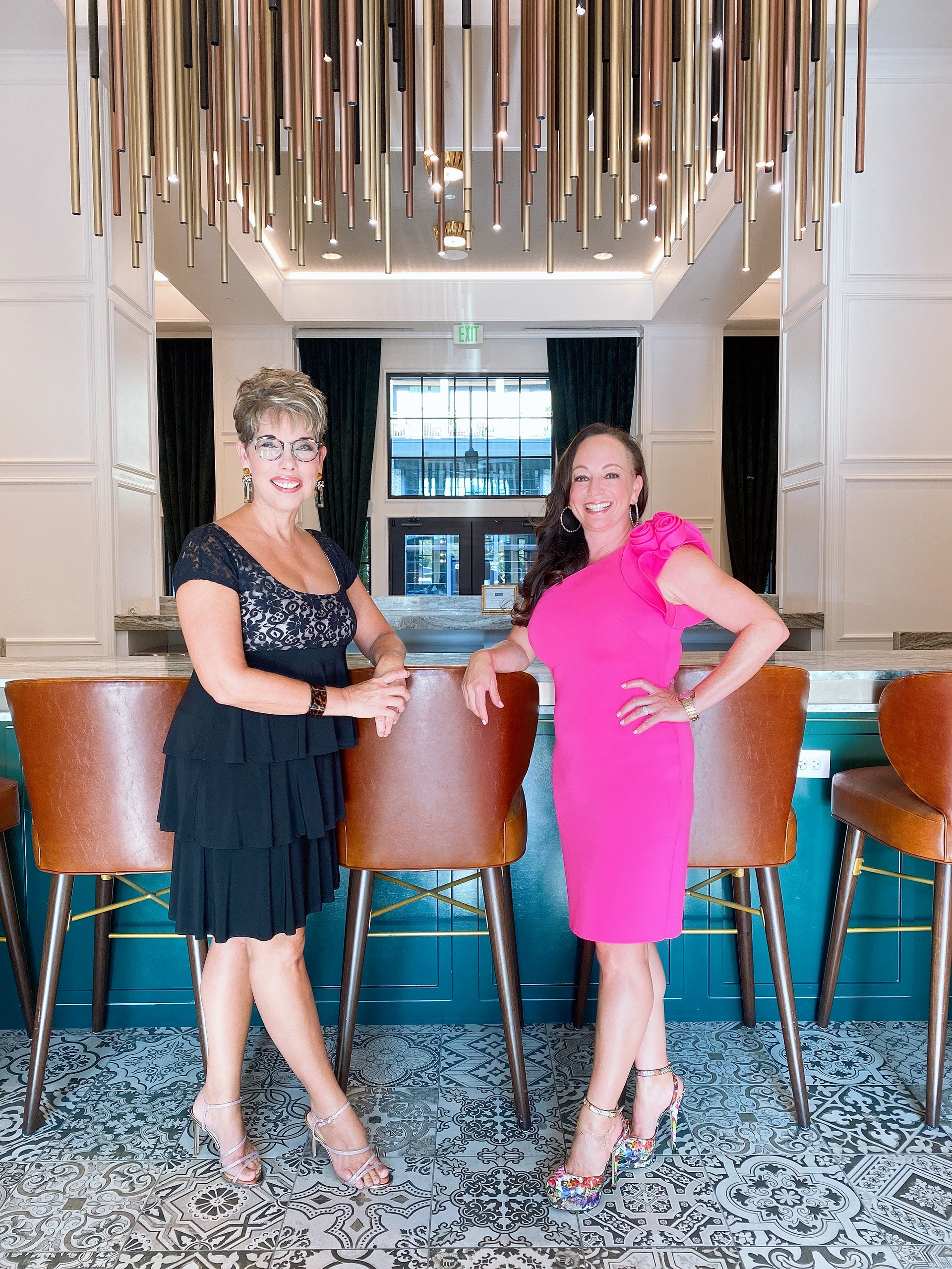 Deb and Gillian in front of flower shoe