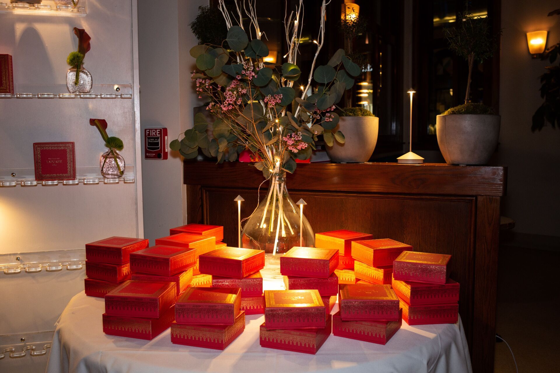 A table with a bunch of red boxes on it