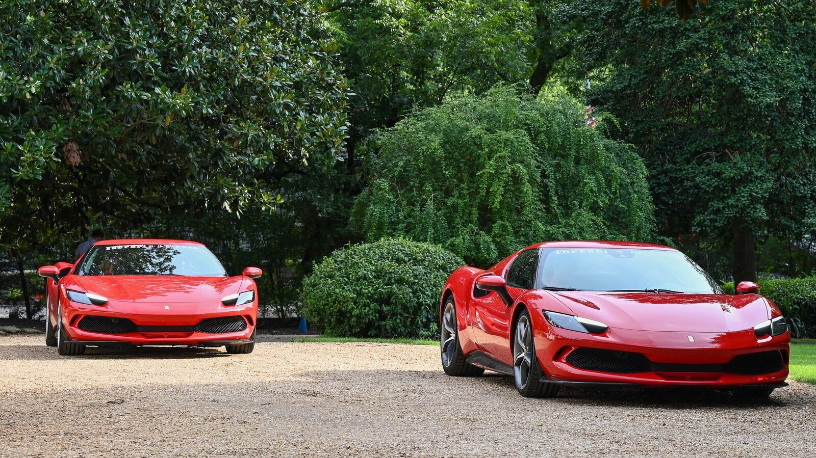 two ferraris at unveiling event