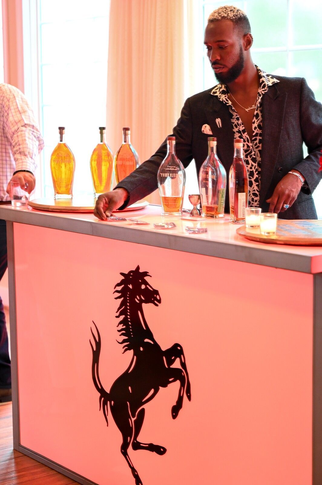 bartender at ferrari unveiling event
