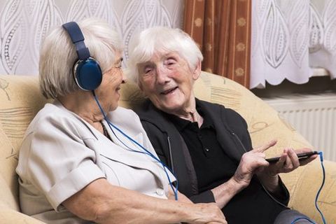 elderly women listening to music