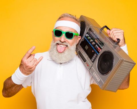 Old man holding the boom box