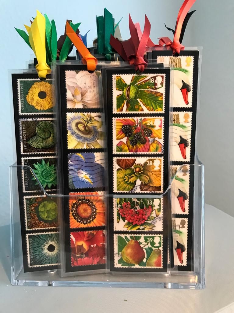 A display of bookmarks made out of postage stamps