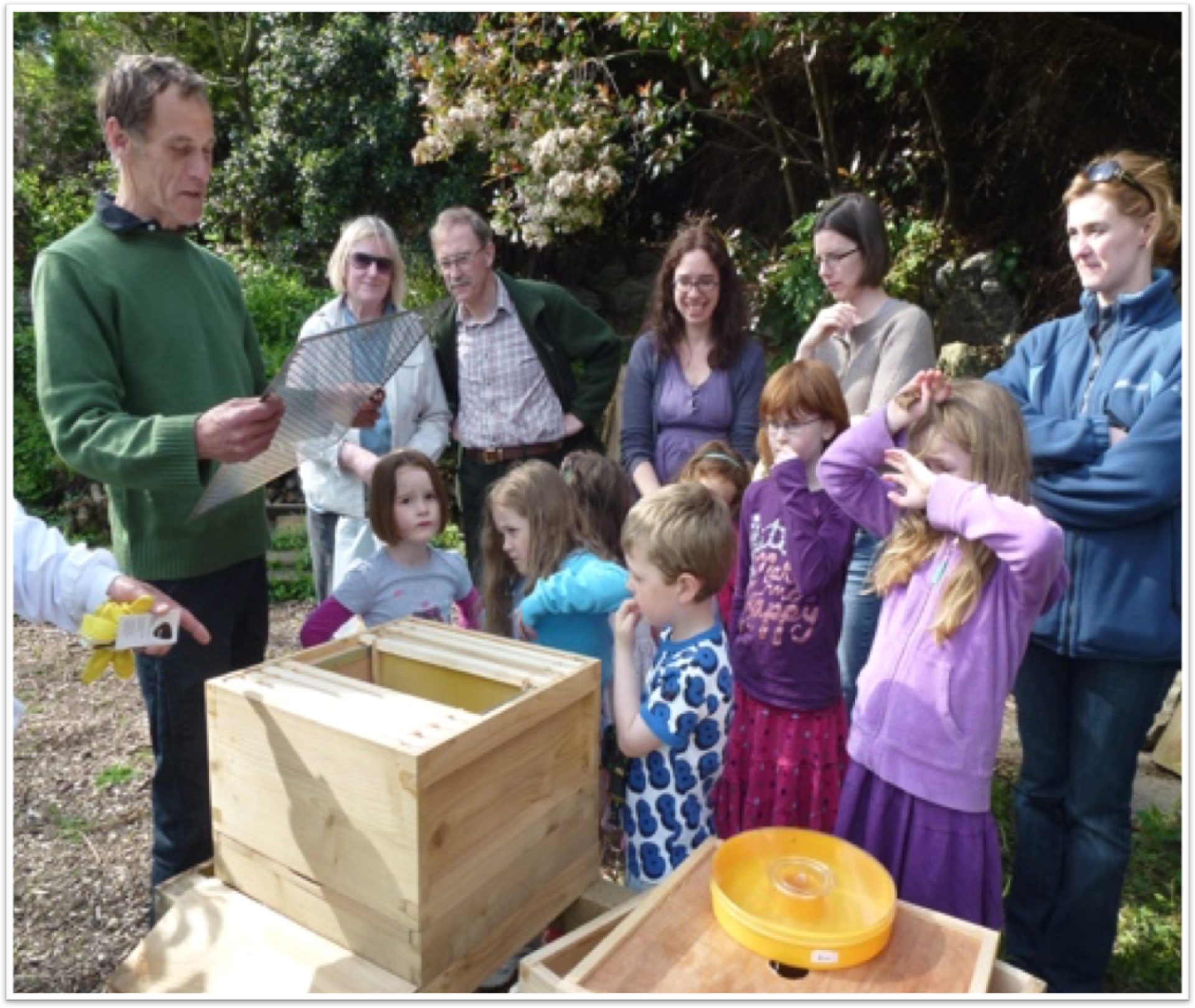 Paul Stiles showing new hives to local children