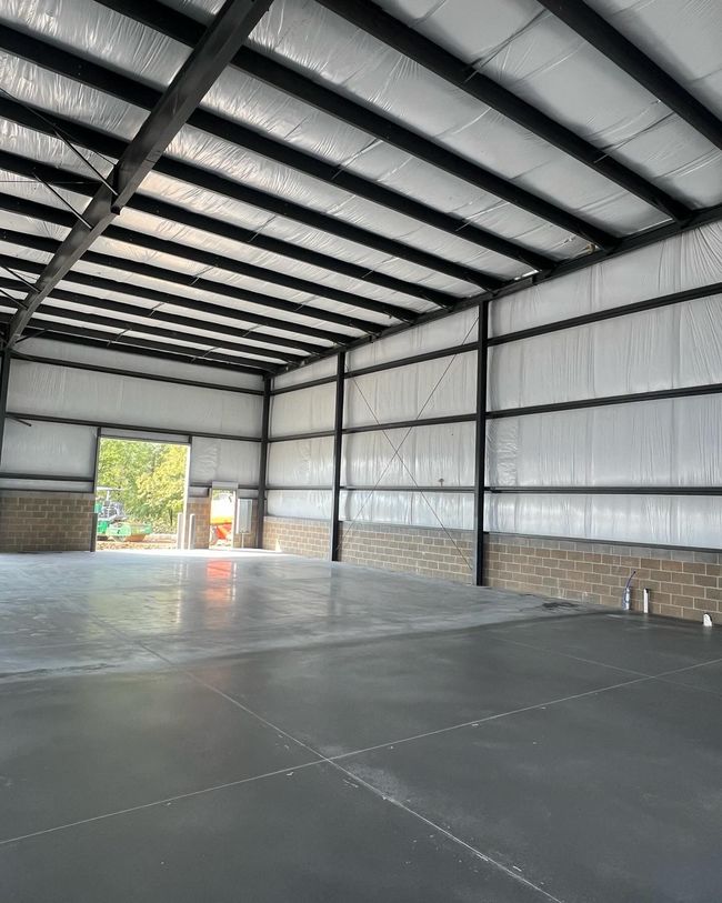 A large empty building with a lot of windows