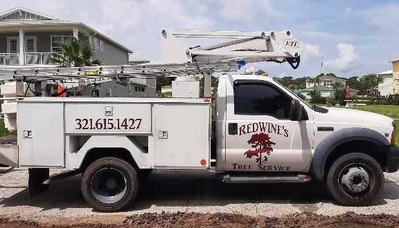 Tree Services Boom Truck – Merritt Island, FL – Redwine’s Tree Service