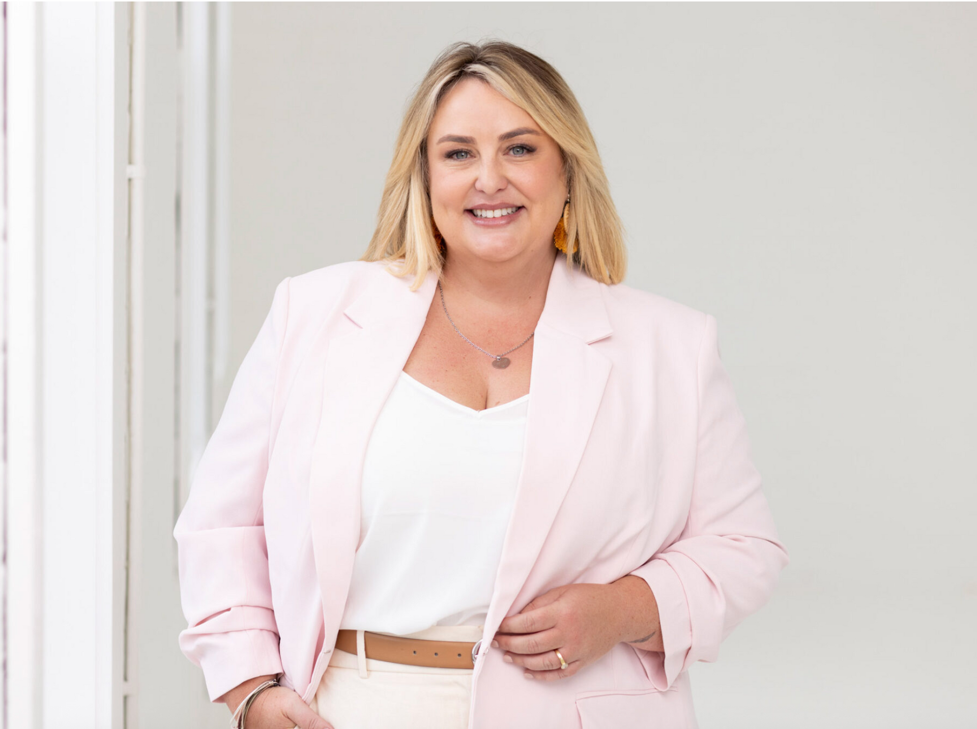 Portrait of Carly Bush, consultant in governance, CSR, & financial strategies, focused on sustainable growth & social impact