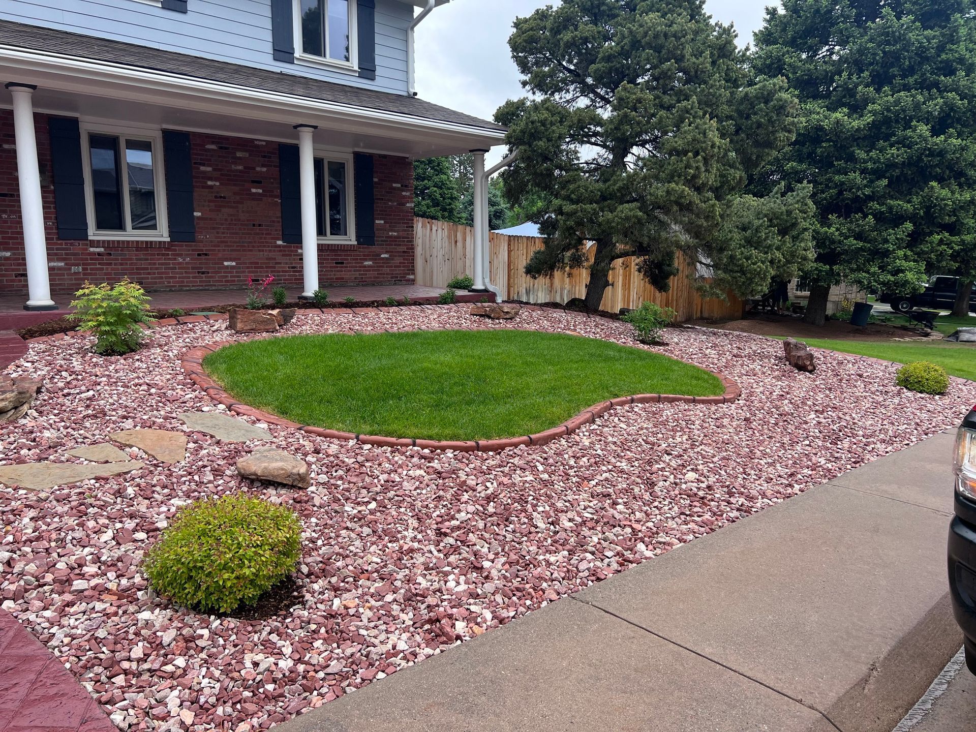 House with Green Lawn and Gravel — Centennial, CO — Colorado Curbing & Landscape