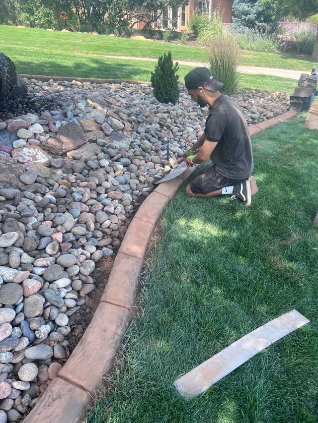 Man Working on the Garden — Centennial, CO — Colorado Curbing & Landscape