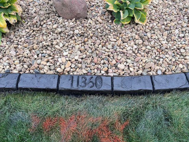 Garden with a House Number Written on It — Centennial, CO — Colorado Curbing & Landscape