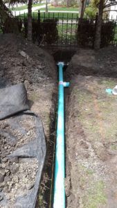 Green Pipe Is Being Installed — Northbrook, IL — Shelly’s Landscape 
