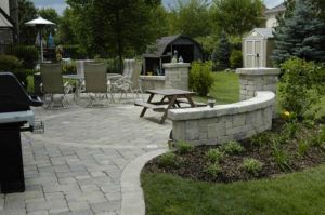 Brick With Chair Outside House — Northbrook, IL — Shelly’s Landscape 