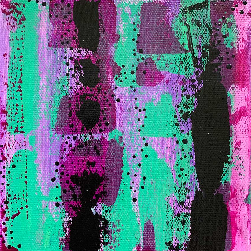 A close up of a purple and green painting on a canvas