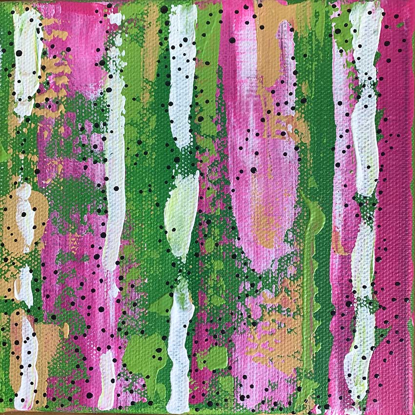 A close up of a pink , green , and white painting on a canvas.