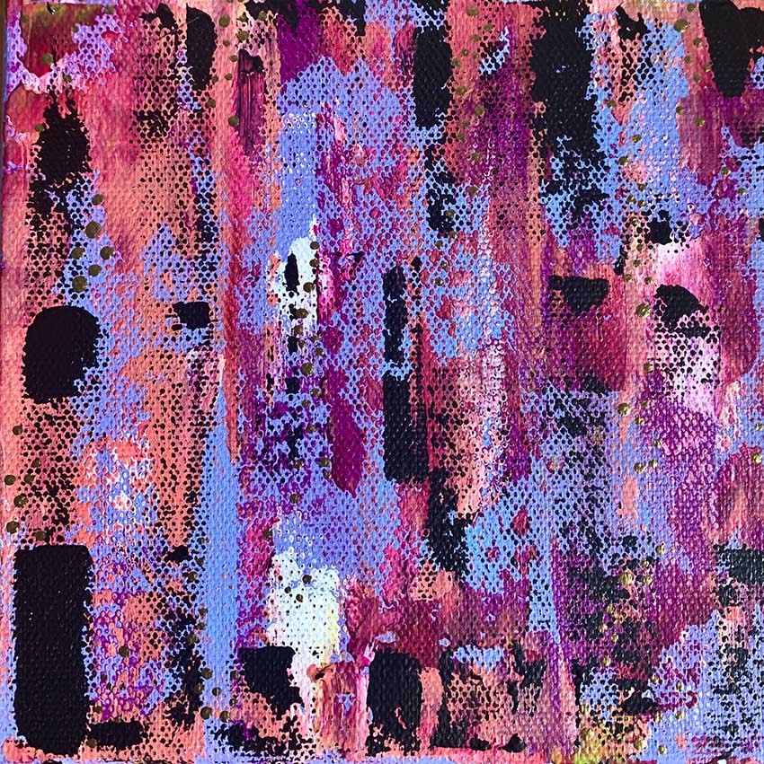 A close up of a colorful abstract painting on a canvas.