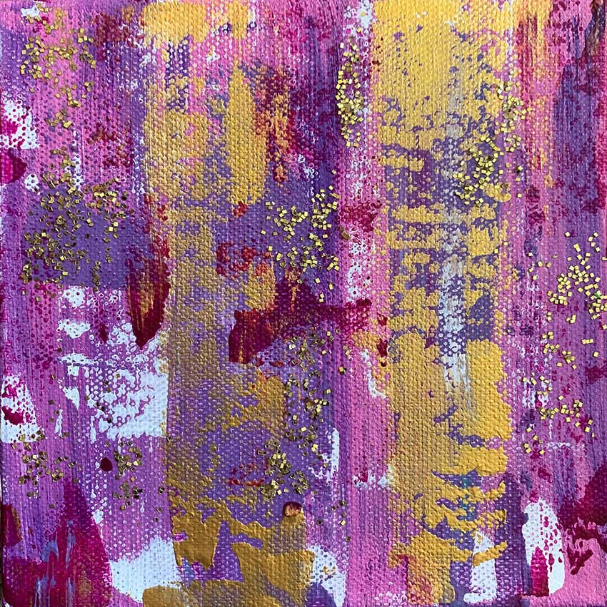 A close up of a purple and yellow painting on a canvas.
