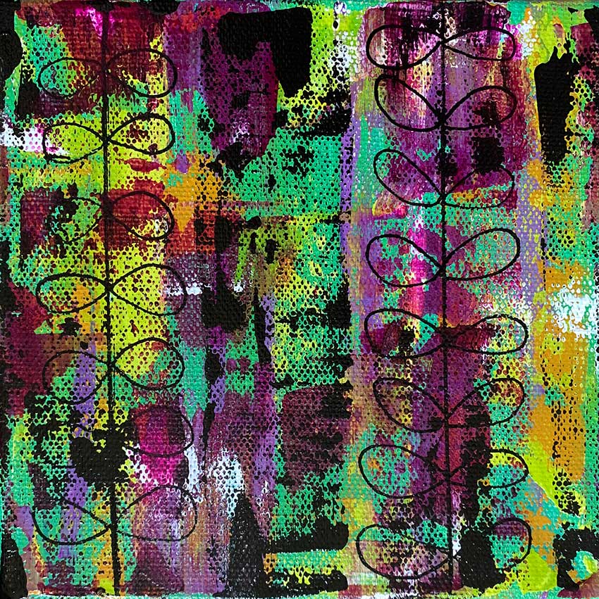 A close up of a colorful painting with a pattern of circles on it.