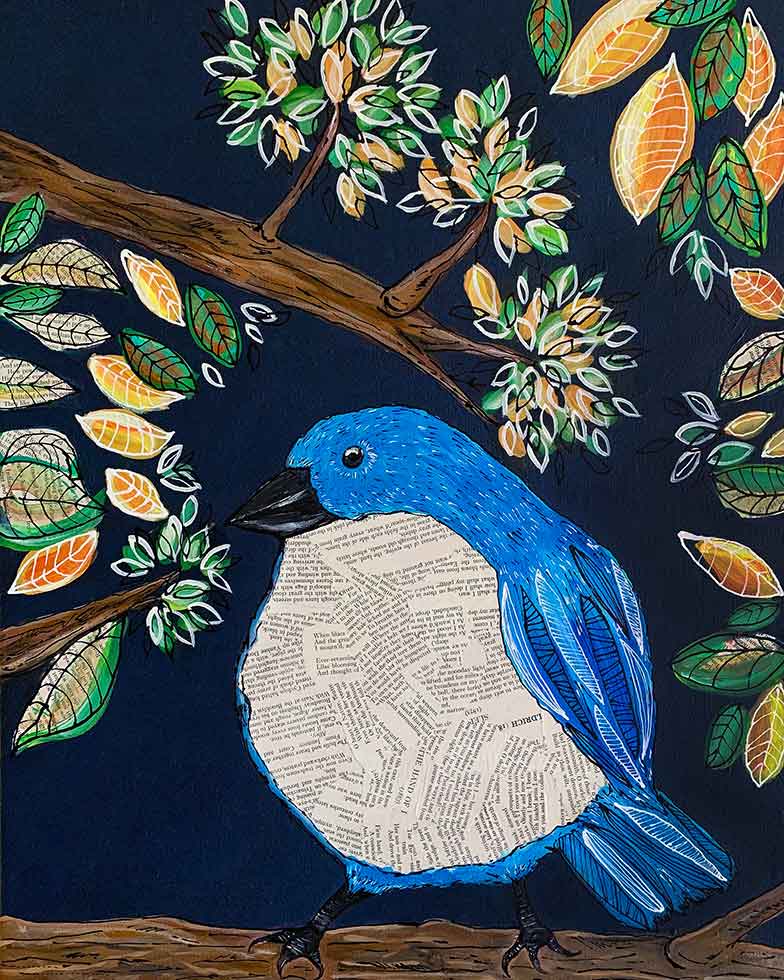 A blue and white bird is perched on a tree branch.