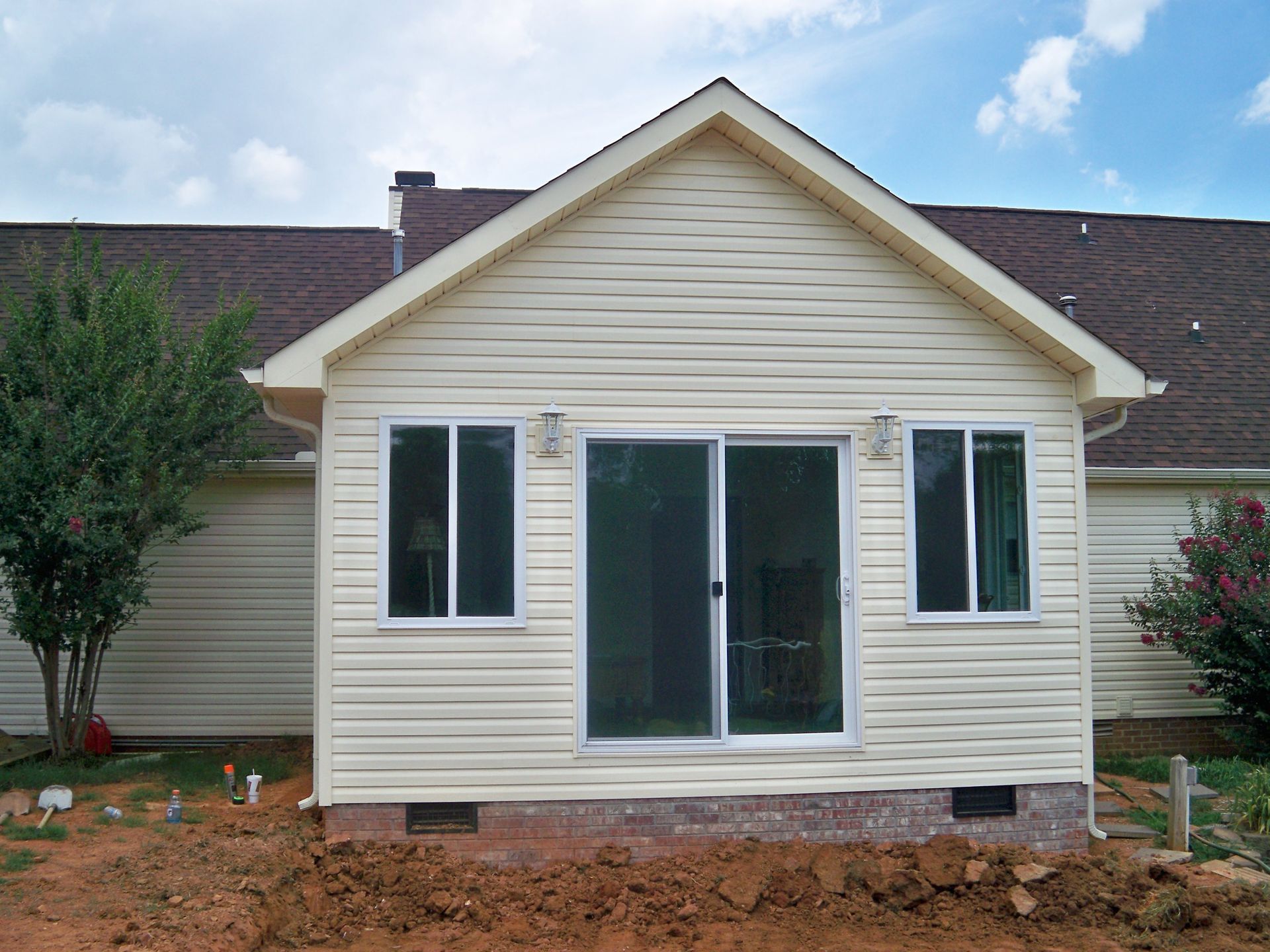 The back of a house with a sliding glass door
