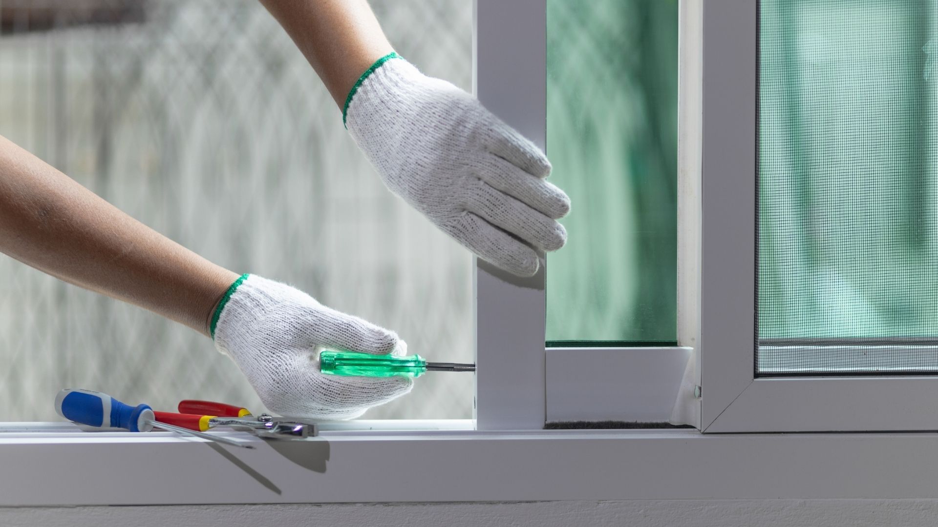 A living room with a large sectional couch and a fireplace