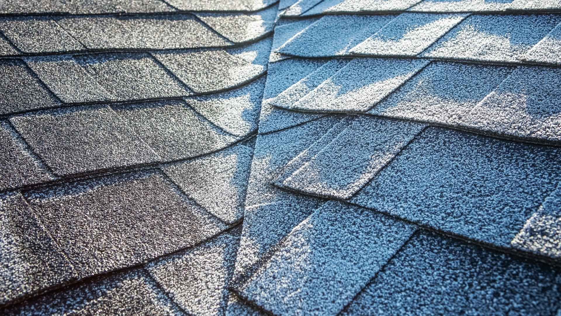 A kitchen with stainless steel appliances and white cabinets