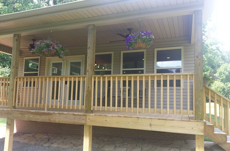 A house with a large porch and stairs